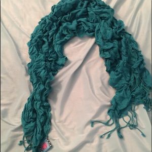 Turquoise scarf with fringe. Like new.